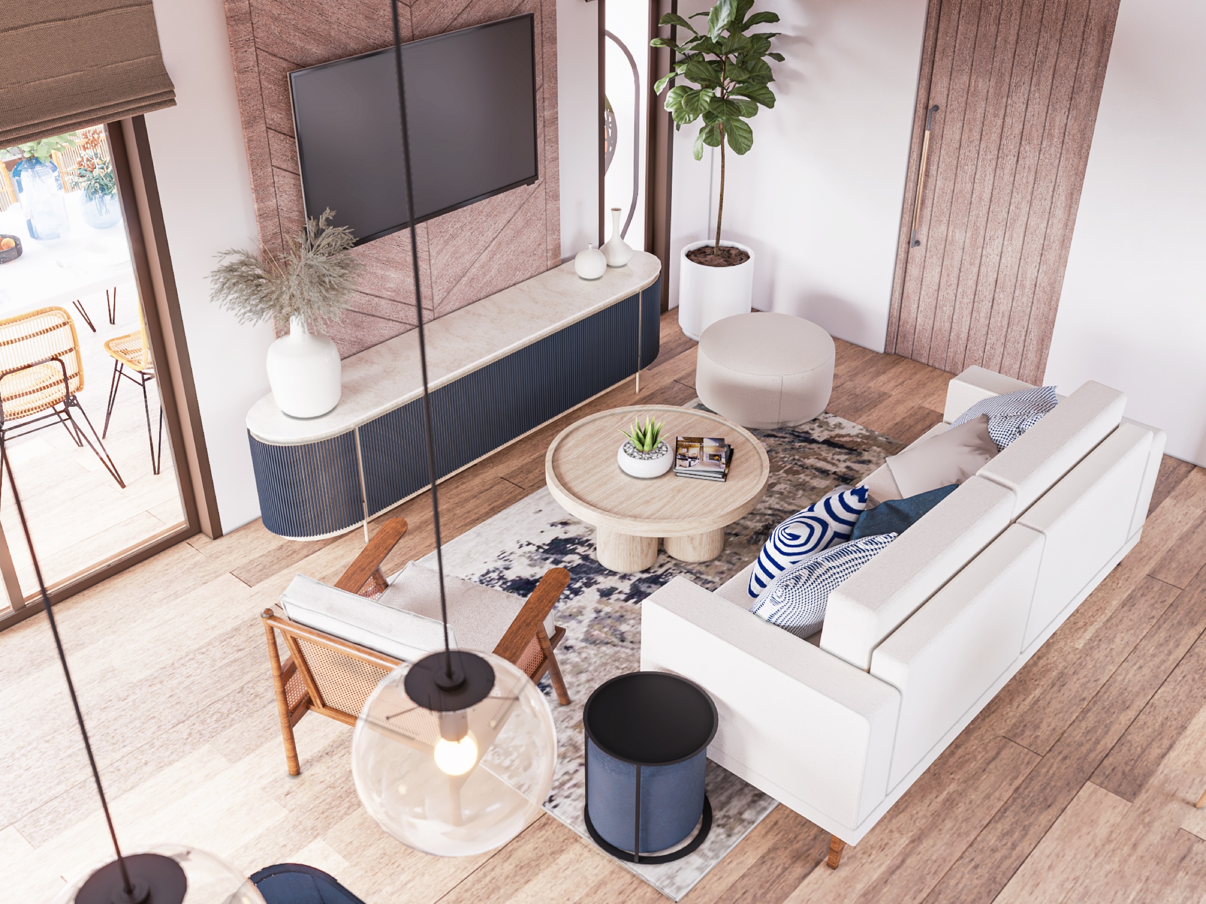 Open living room filled with daylight and warm natural finishes.
