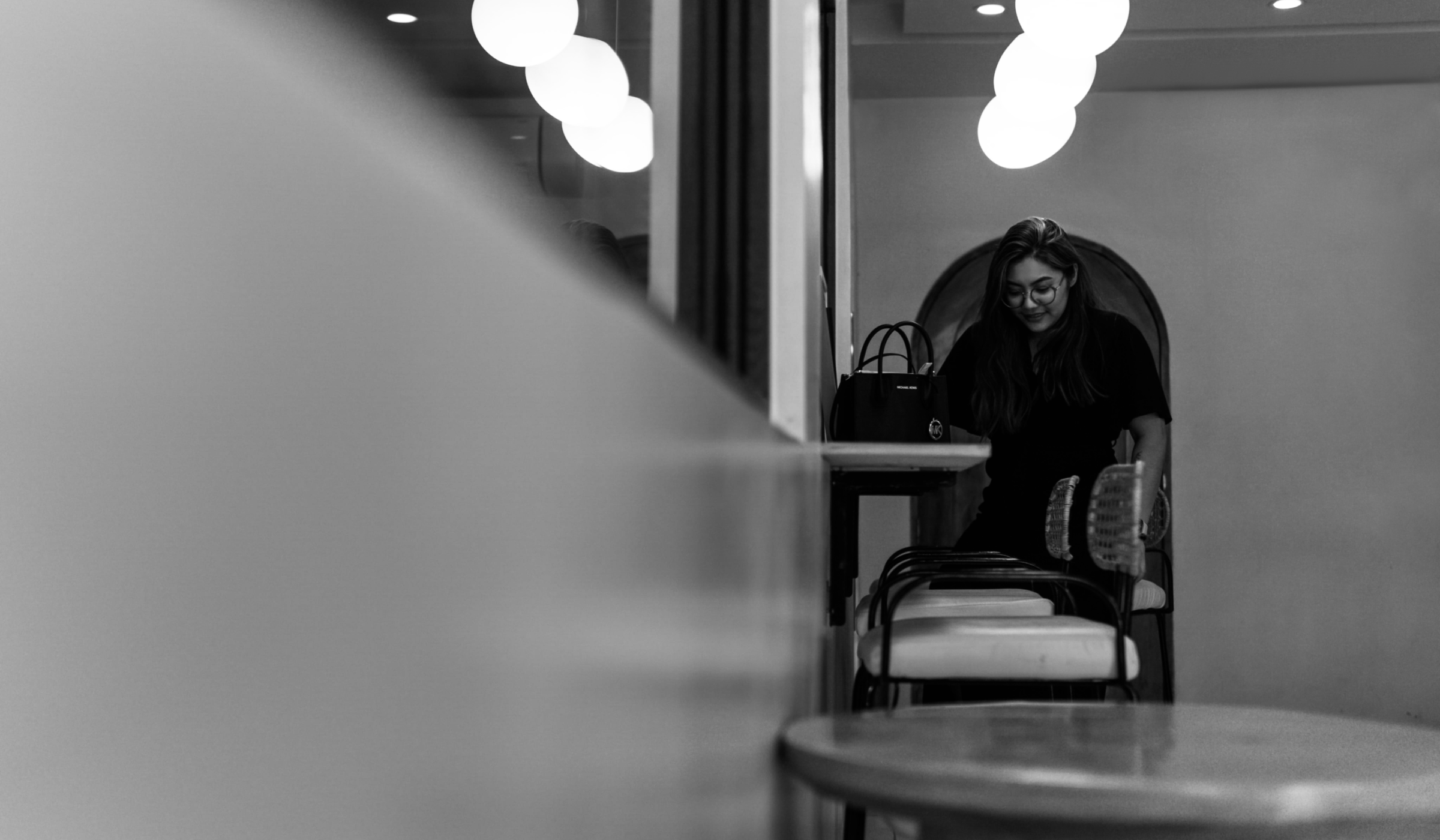Charlene working in a café interior