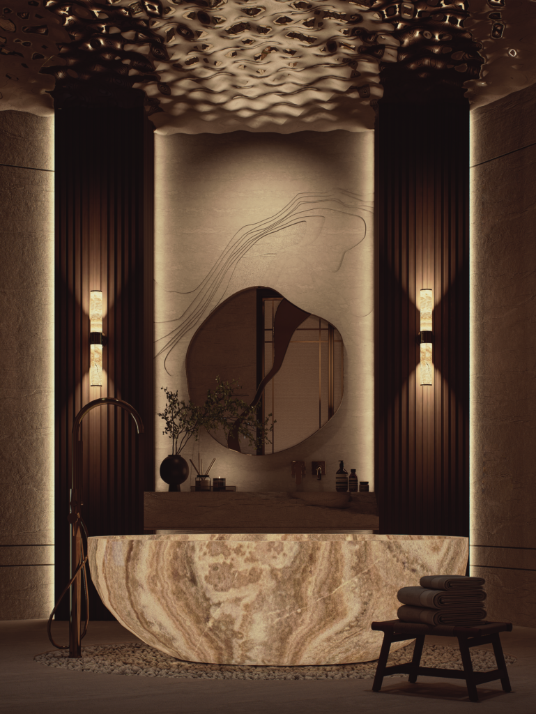 Sculptural bathroom finished in pale stone and warm light.